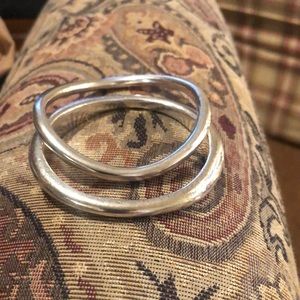 Two handmade sterling silver bracelets